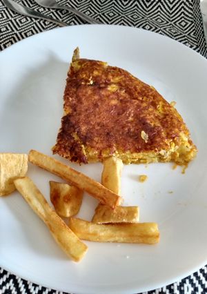 Una foto de Tortilla de papa y carne