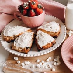 A picture of SCONES with red berries & white chocolate chips!! 🍓🥛.
