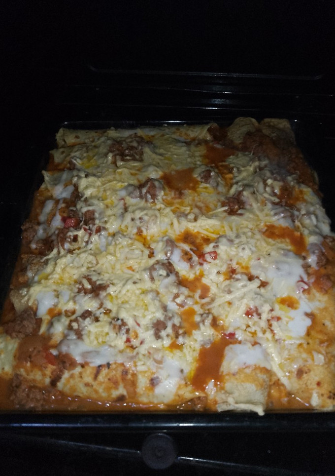 Una foto de Canelones de verdura y carne con bechamel