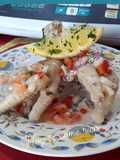 Patas de pollo con salsa criolla