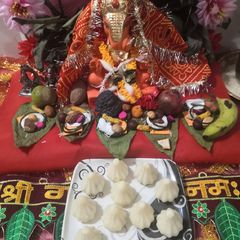 Stuffed gulkand and coconut jaggery rava modak A picture of Stuffed gulkand and coconut jaggery rava modak.
