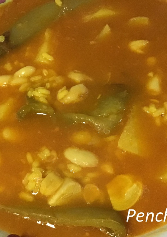 Una foto de Arroz y habichuelas con ajos tiernos
