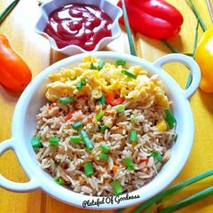 A picture of Burnt Garlic Fried Rice with scrambled eggs.