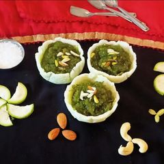 Bottle gourd Halwa In Coconut basket A picture of Bottle gourd Halwa In Coconut basket.