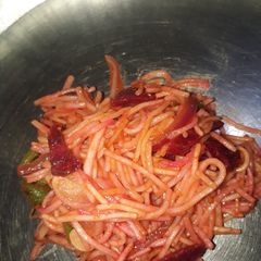 A picture of Noodles with beetroot.