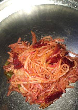 A picture of Noodles with beetroot.