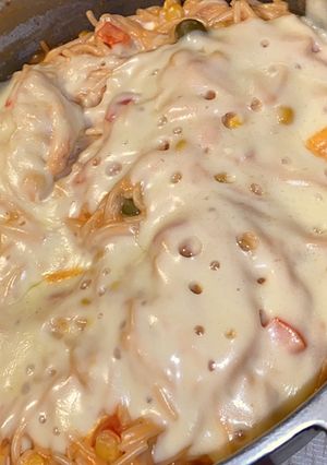 Una foto de Espaguetis con queso 🧀 estilo dominicano