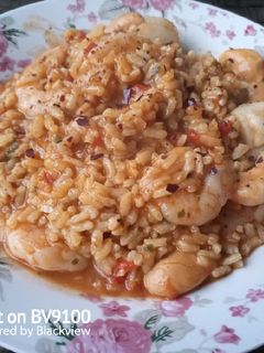 Una foto de Arroz meloso con vieiras y langostinos en olla eléctrica