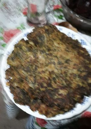 Una foto de Tortilla acelga acompañada