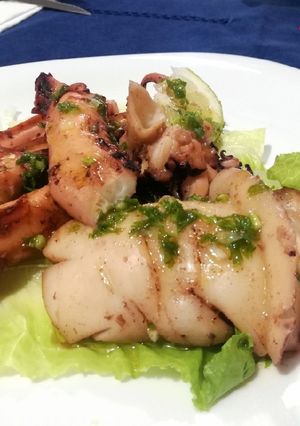 A picture of Grilled Cuttlefish with Salsa Verde.