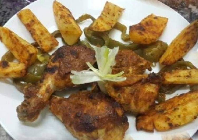 Steps to Prepare Quick Oven Baked Chicken with Potato Wedges