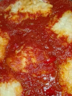 Una foto de Bacalao con tomate