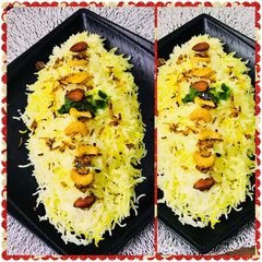 A picture of Zafrani pulao with richness of nuts.