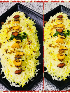 A picture of Zafrani pulao with richness of nuts.