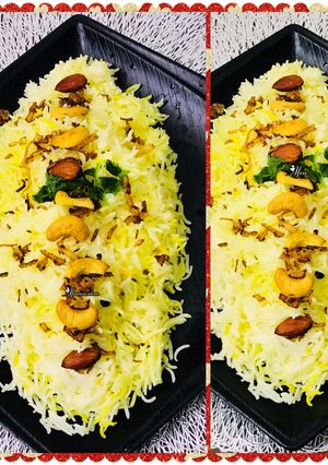 A picture of Zafrani pulao with richness of nuts.