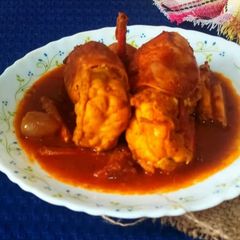 A picture of Chingri Malai Curry.