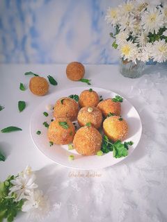 صورة لوصفة كرات البطاطا بحشوة الجبنة الموزاريلا 😇