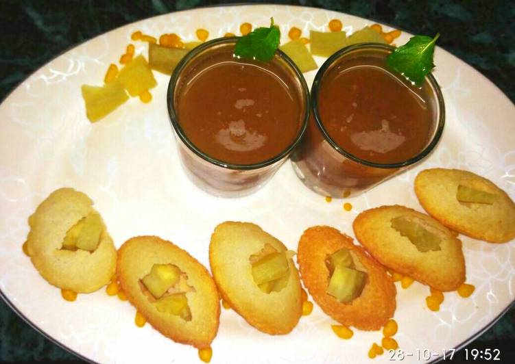 Shakkarkandi stuffed golgappas with water