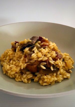 Una foto de Arroz cremoso de jamón ibérico y setas