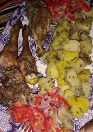 A picture of Oven roasted potatoes and chicken.