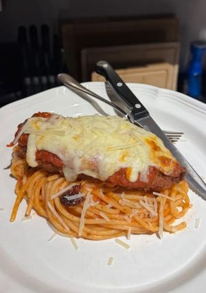 A picture of Chicken Parmesan with Spaghetti.