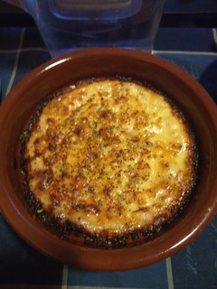 Una foto de Queso provolone al horno