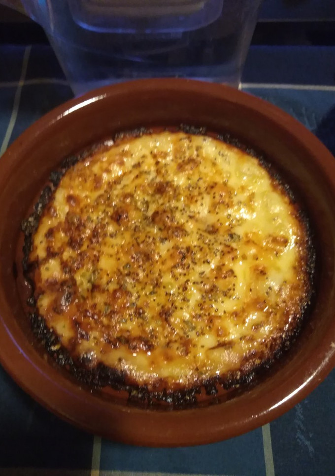 Una foto de Queso provolone al horno