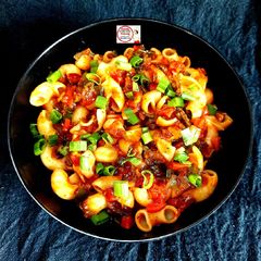 A picture of Veg Spicy Schezwan Pasta.
