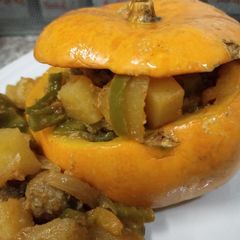 A picture of Pumpkin stuffed meat and Vegetables.