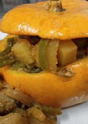 A picture of Pumpkin stuffed meat and Vegetables.