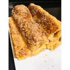 A picture of Apple French roll ups with cinnamon & cream cheese.
