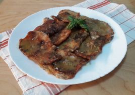Muschi de porc cu vin