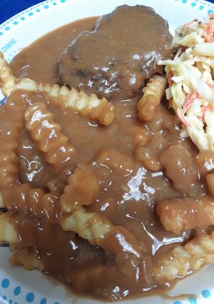 A picture of Salisbury Steaks and Fries.