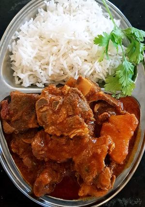 A picture of Beef Stew with Rice.