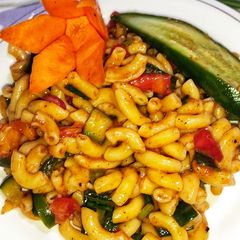 A picture of Vegetables Elbow Macaroni With Red Sauce.