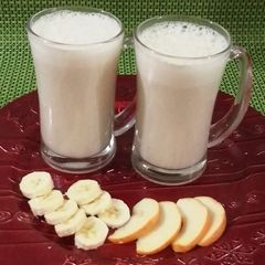 A picture of Apple and banana milk shake.