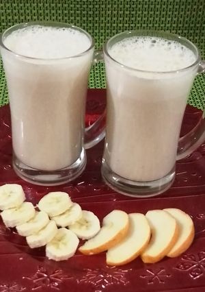 A picture of Apple and banana milk shake.