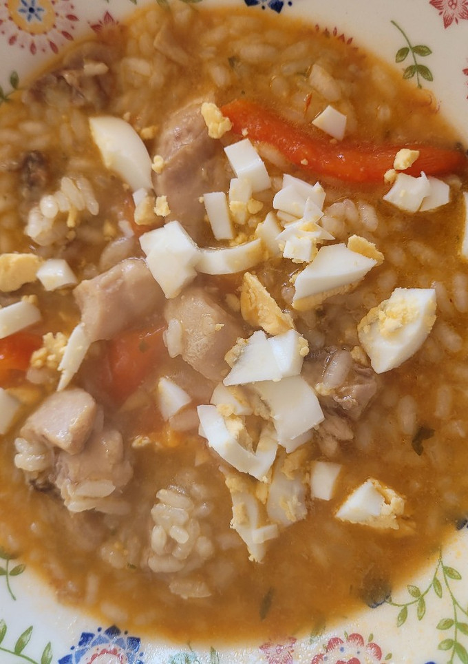 Una foto de Arroz caldoso de conejo