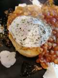 Poached egg, spicy baked beans on toast, marmalade and yoghurt
