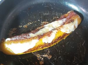 Una foto de Plátano con queso y bocadillo al sartén