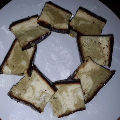 A picture of Sig's Goats Cheese Cake with Matcha.