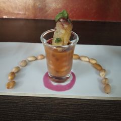 A picture of Peanut usal with sweet potato sago roll.