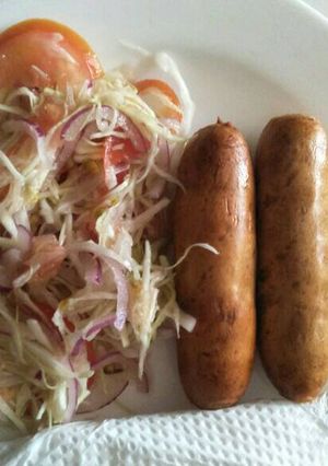 A picture of Cabbage salad with sausage.