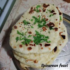Kulcha Naan/ Indian flat bread A picture of Kulcha Naan/ Indian flat bread.