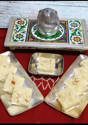 A picture of Paneer Coconut Barfi.- "where Devotion Turns into Dessert.".
