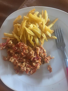 A picture of Potato Fries and Egg Sauce.