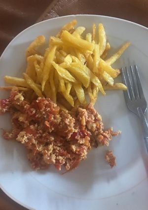 A picture of Potato Fries and Egg Sauce.