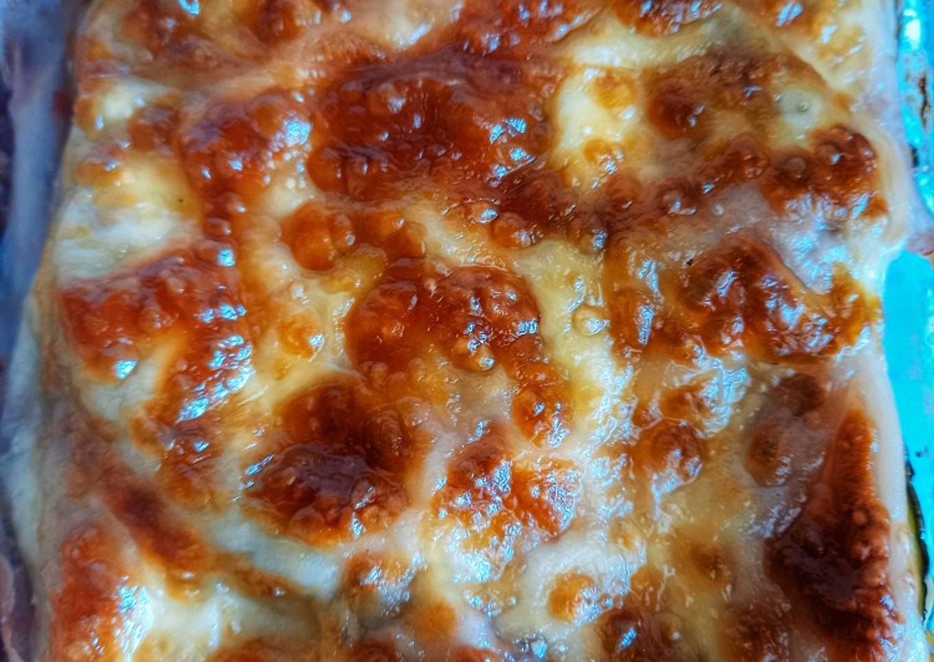 Lasagna de Bernejena y zapallitos con Bolognesa gratinada
