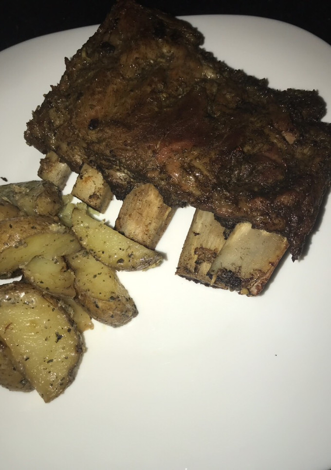Una foto de Costilla con papas