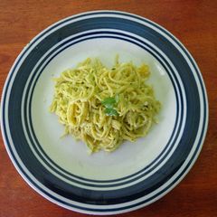 A picture of Noodles in Coriander and Cashew pesto.